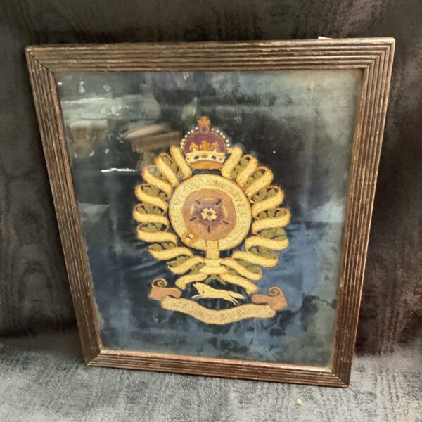 Antique Royal Fusiliers tapestry with detailed military embroidery.
