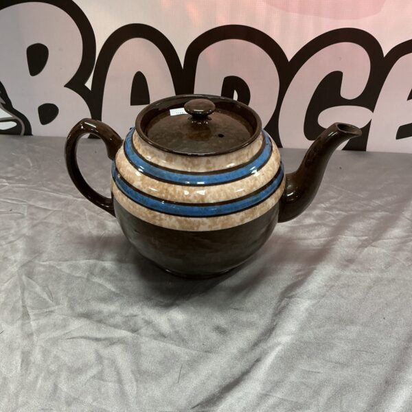 Vintage Sadler Pottery teapot with floral design.
