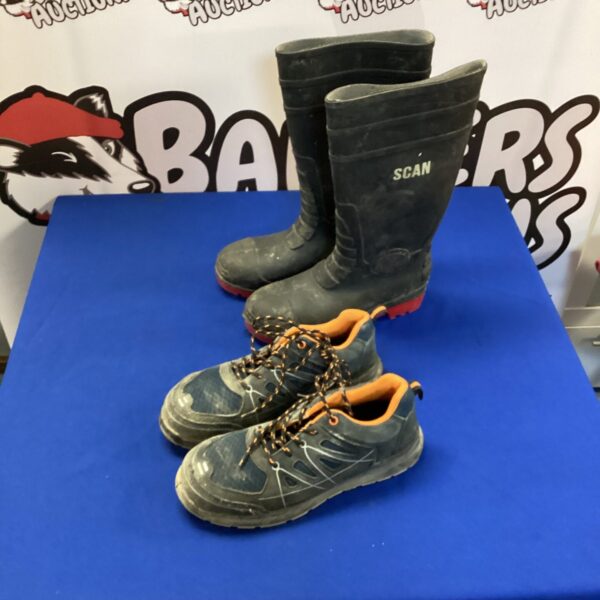 Pair of safety shoes and Wellington boots in a footwear lot.