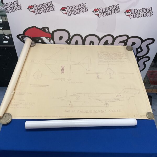 Vintage Saro SR53 blueprint and Concorde poster displayed on a table.