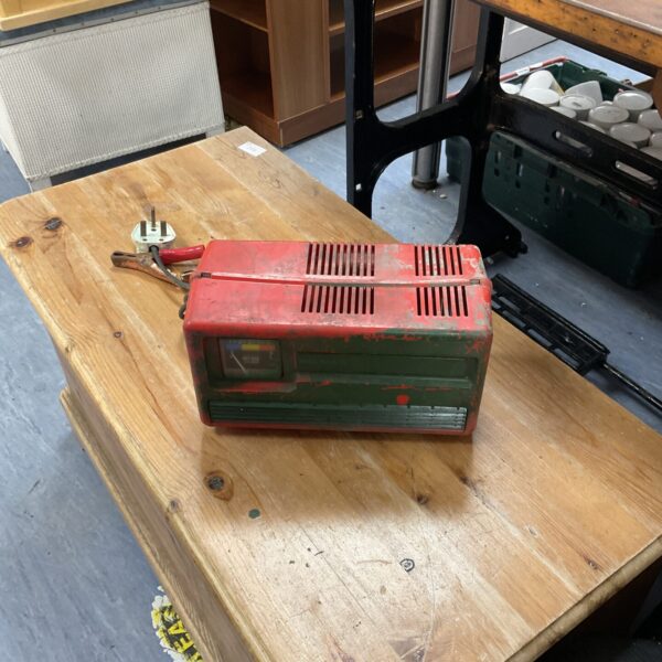 Vintage Selmar 12v battery charger in red and black.
