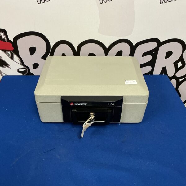 Front view of a Sentry secure box with key.