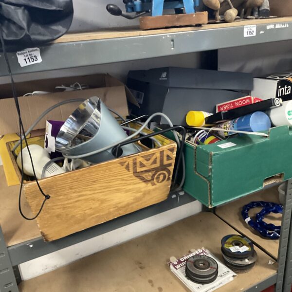 Shed clearance lot with heat lamp and tools.