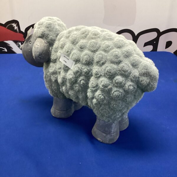 Rustic sheep door stop for farmhouse style homes.