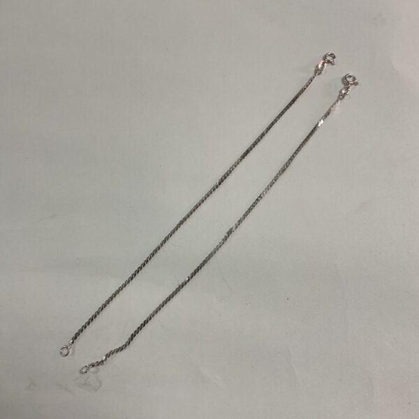 Pair of delicate 925 silver chain bracelets with interwoven links.