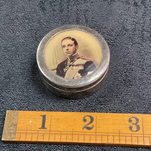 Antique silver pill pot with military portrait on lid.