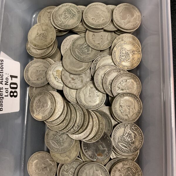 A lot of silver shillings, British coins for collectors.
