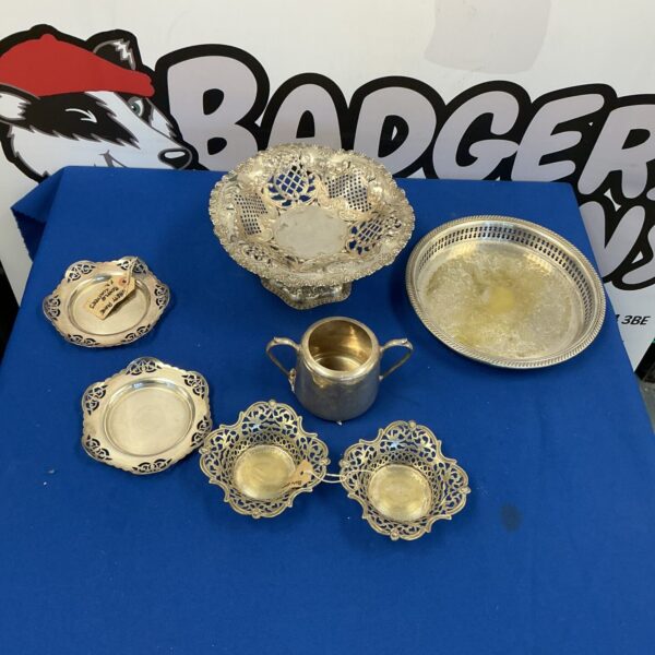 Vintage silverplate tableware selection with fruit stand.