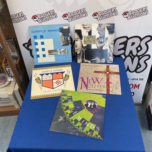 Simple Minds LP collection featuring New Gold Dream vinyl record.