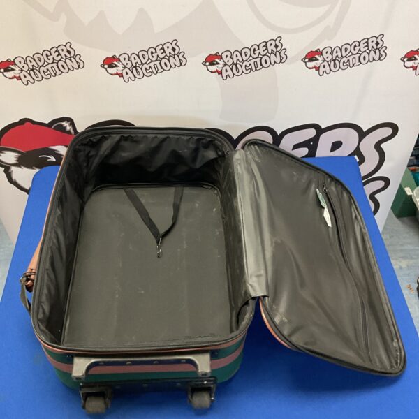 Front view of a vintage Skybags VIP hard shell suitcase.