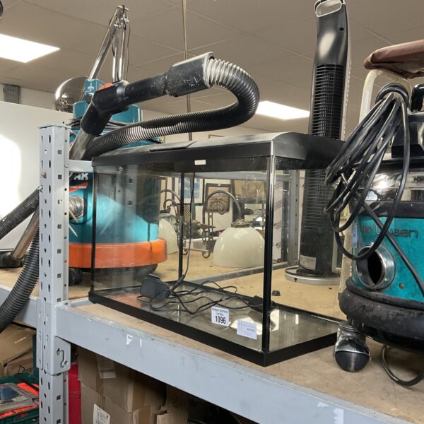 Small lighted fish tank for desktop use.