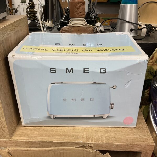 Vintage Smeg toaster with a curved body and non-working element.
