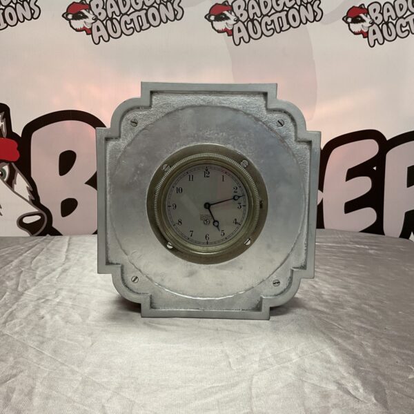 Vintage Smiths car clock for dashboard mounting.