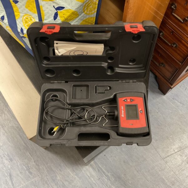 Closed Snap On bore scope case with tool inside.