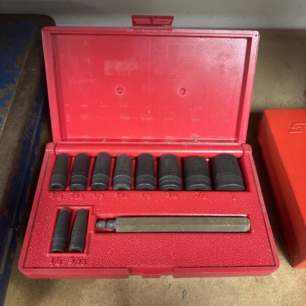 Snap On 11-piece gasket punch set in a red case.