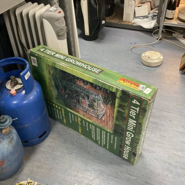 Soneva 4 tier grow house for indoor gardening and plant display.