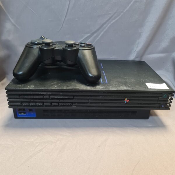 Black Sony PlayStation 2 console with controller for retro gaming.