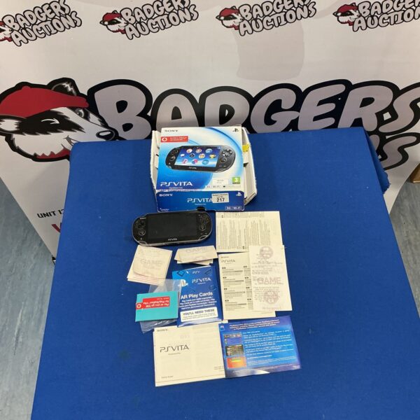Sony PS Vita handheld console with AR play cards included.