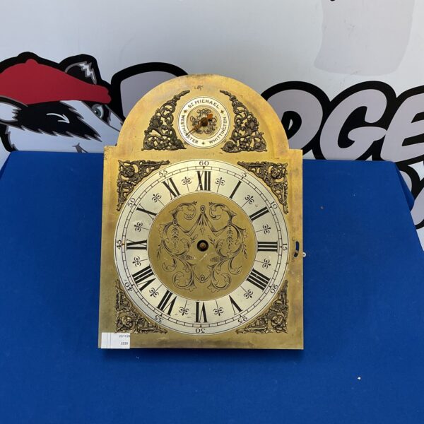 Antique St Micheal Whittington clock face with movement for restoration.