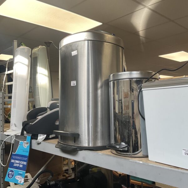 Silver stainless steel pedal bin for kitchen waste disposal.