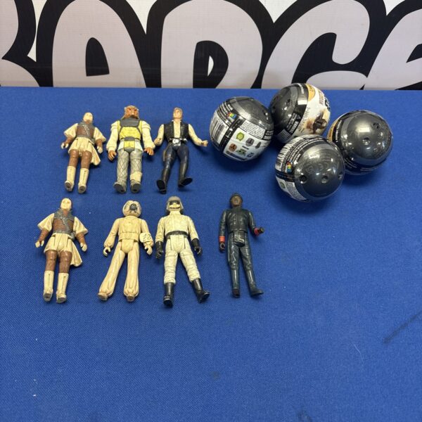 Vintage Star Wars toy lot with Mandalorian Mashems and action figures.