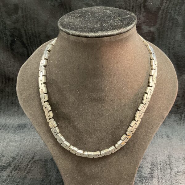 Close-up of a hallmarked sterling silver heavy link necklace.
