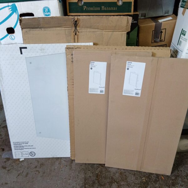 New goodhome Stevia cupboard doors and clear glass splashback in packaging.
