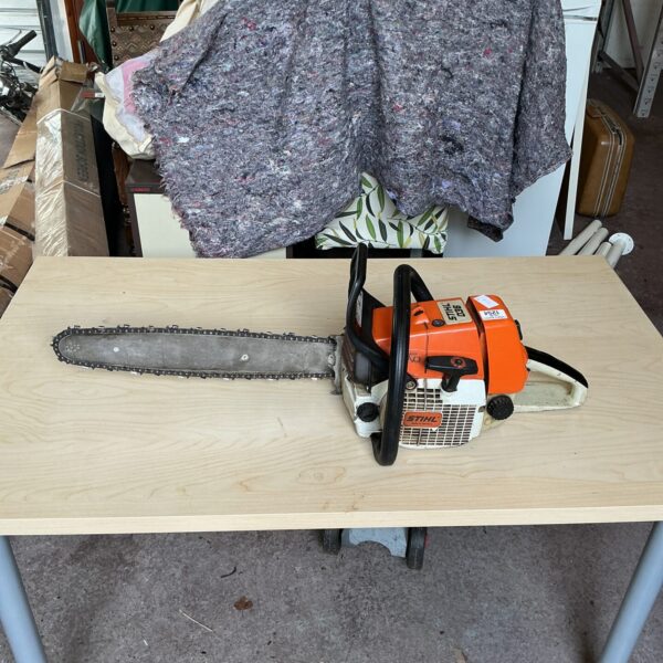 Vintage Stihl 036 chainsaw for sale, petrol powered forestry tool.