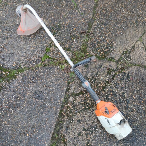 Used Stihl FS36 petrol strimmer for garden maintenance.