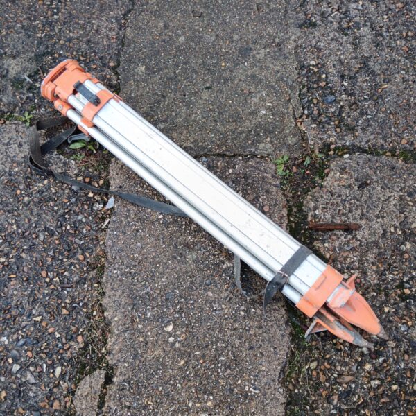 Aluminium surveyors tripod with adjustable legs and spiked feet.