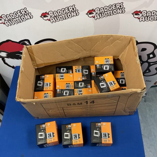 Boxed Swap smart watches and phones in a tech lot.