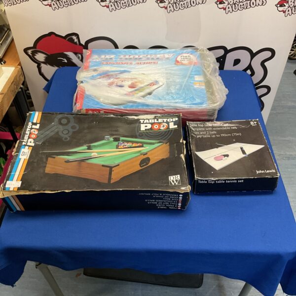 Vintage tabletop pool game set with air hockey and tennis.