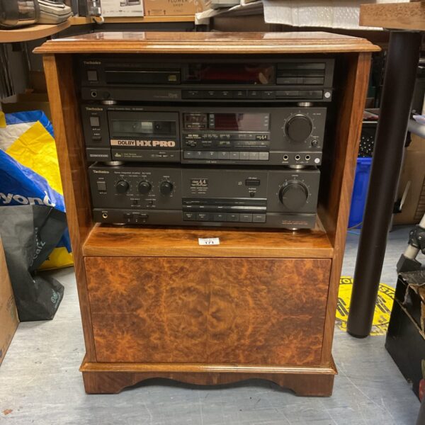 Black Technics Hi-Fi system cabinet with integrated components.