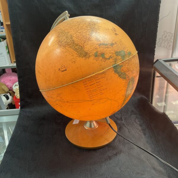 Vintage Tecnodidattica illuminated globe on wooden base.