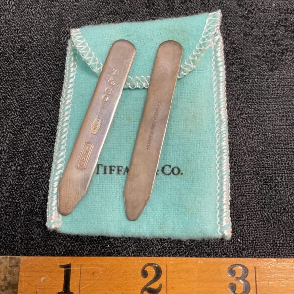 Vintage Tiffany & Co. silver collar stays in protective pouch.