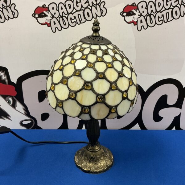 Vintage Tiffany style table lamp with stained glass shade.