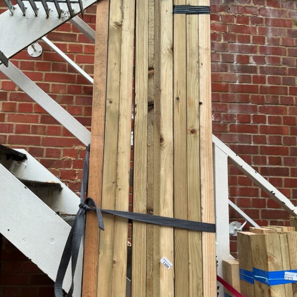 Three bundles of 10ft timber for construction projects.