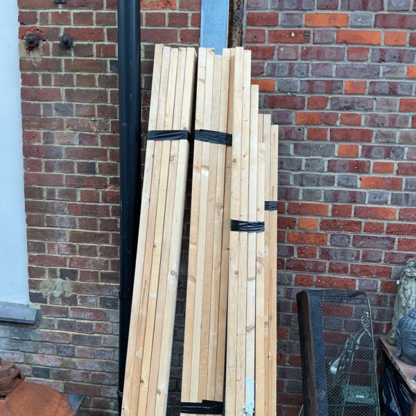 Bundled packs of 7ft timber for construction and DIY projects.
