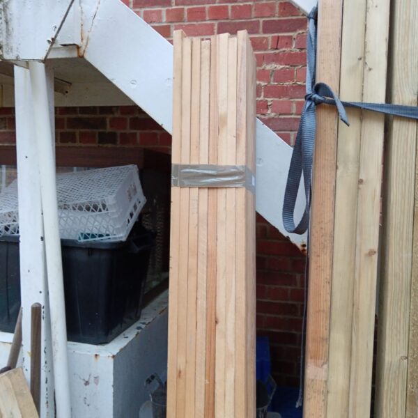 Lot of eight softwood timber planks for DIY projects.