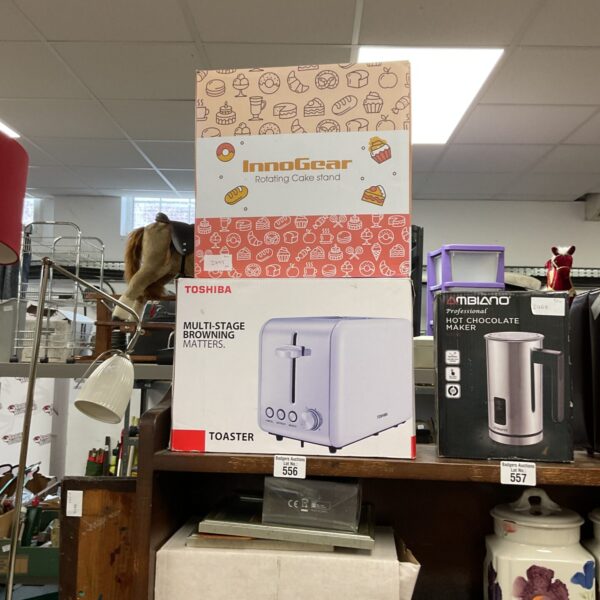 Vintage Toshiba toaster with Inno Gear cake stand for collectors.