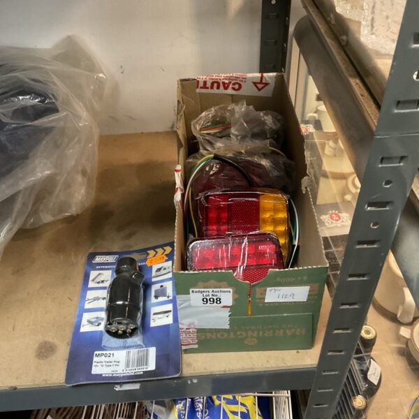 7-pin trailer plug in original packaging, automotive connector.