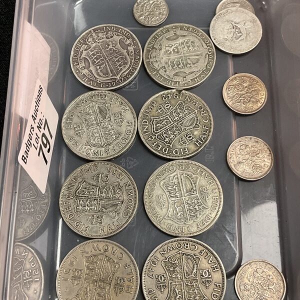 Tray of mixed coins including silver half crowns and vintage British coinage.