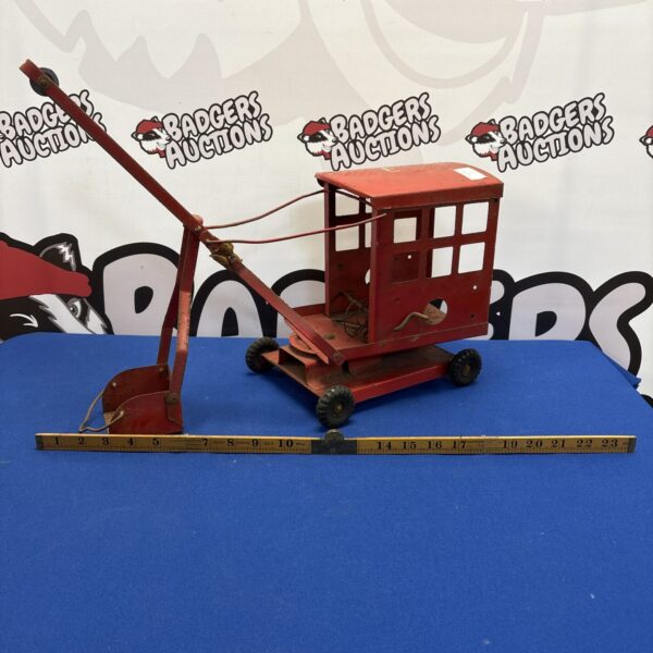 Vintage Triang mobile crane, a classic tinplate toy for collectors.