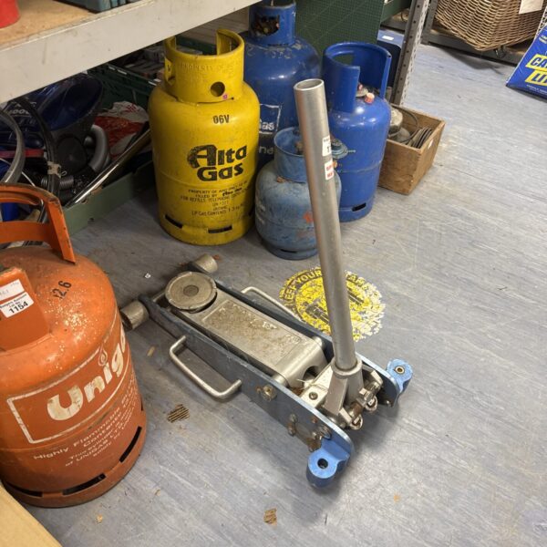 Large trolley jack for spares and repairs, missing wheel.