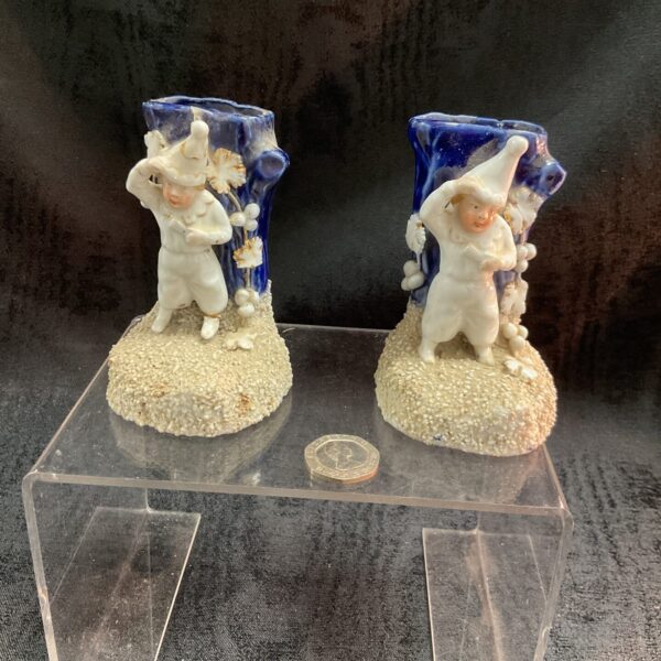 Antique Victorian spill vases, a delicate porcelain pair.