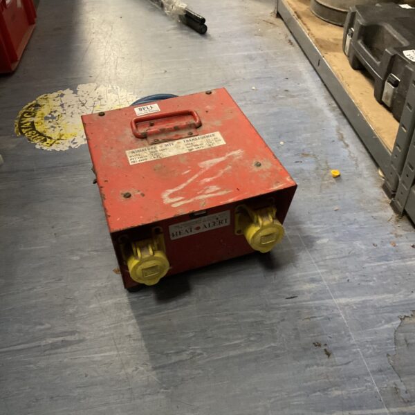 Vintage 110v transformer block with single output socket.