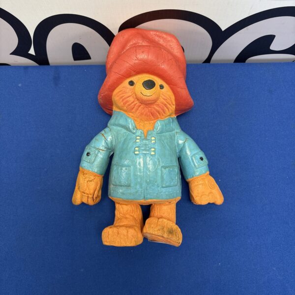 Vintage 1974 Paddington Bear foam toy in blue coat.