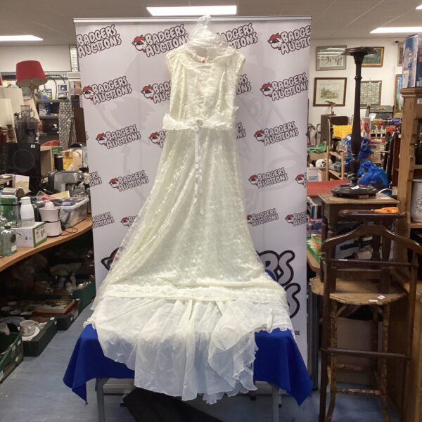 Vintage 1980s wedding dress with lace detailing.