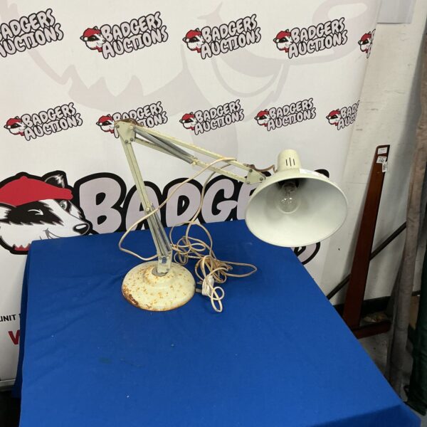 Vintage metal Anglepoise desk lamp with adjustable arm.