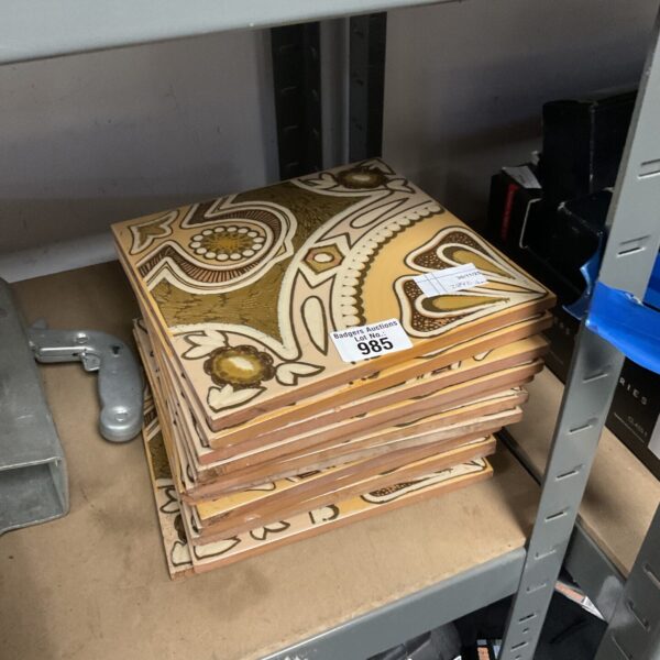 Bundle of vintage ceramic tiles with Art Deco pattern.